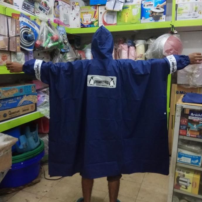 .........] Jas hujan Penguin poncho lengan