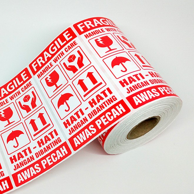 

PEREKAT-PENGIKAT- STICKER LABEL FRAGILE HATI-HATI AWAS PECAH 9,5X5 CM (1 ROLL/ 500 PCS) - DASAR