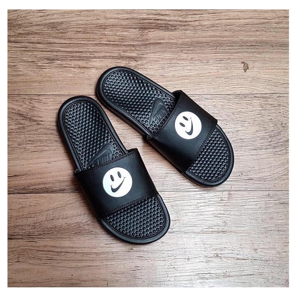 nike smiley slides