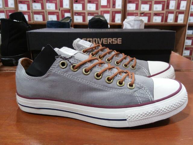 tan low top converse