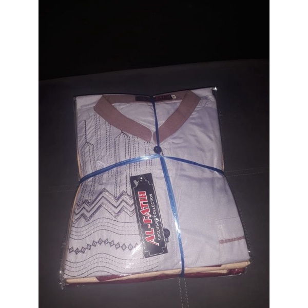 baju koko lelang