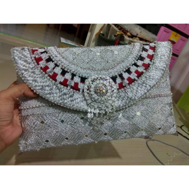 Tas dompet clutch tapis matokibau silver