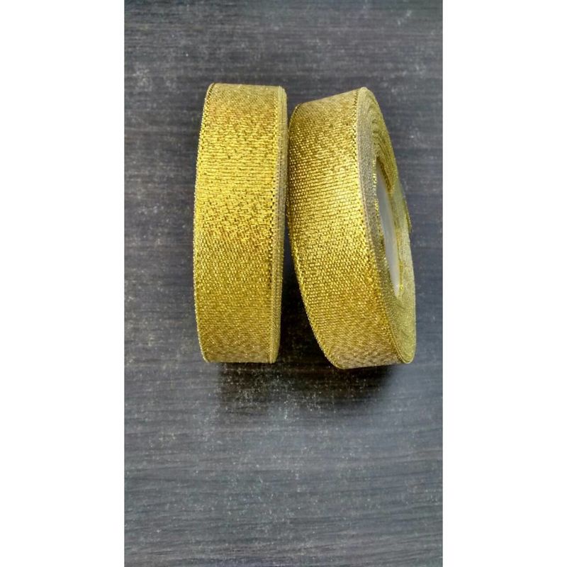 

pita gold silver 2 cm pita emas / perak per rol