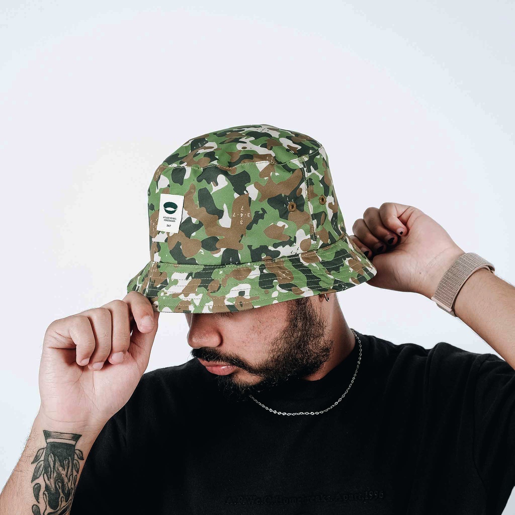 UNKL347 Topi Bucket Hat Warna Olive Detail Motif Camo BUCK