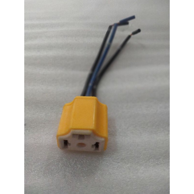 Fitting lampu depan motor Vixion