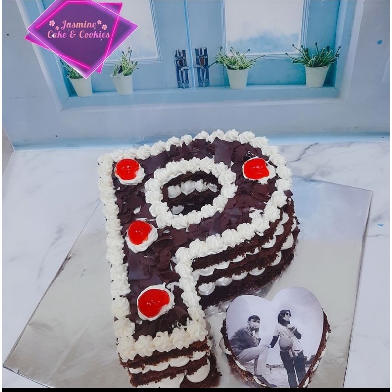 

Kue inisial huruf