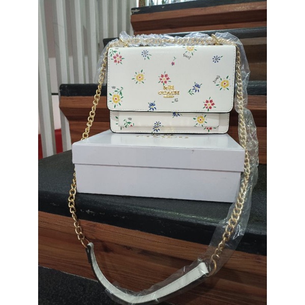 coach sling bag motif bunga