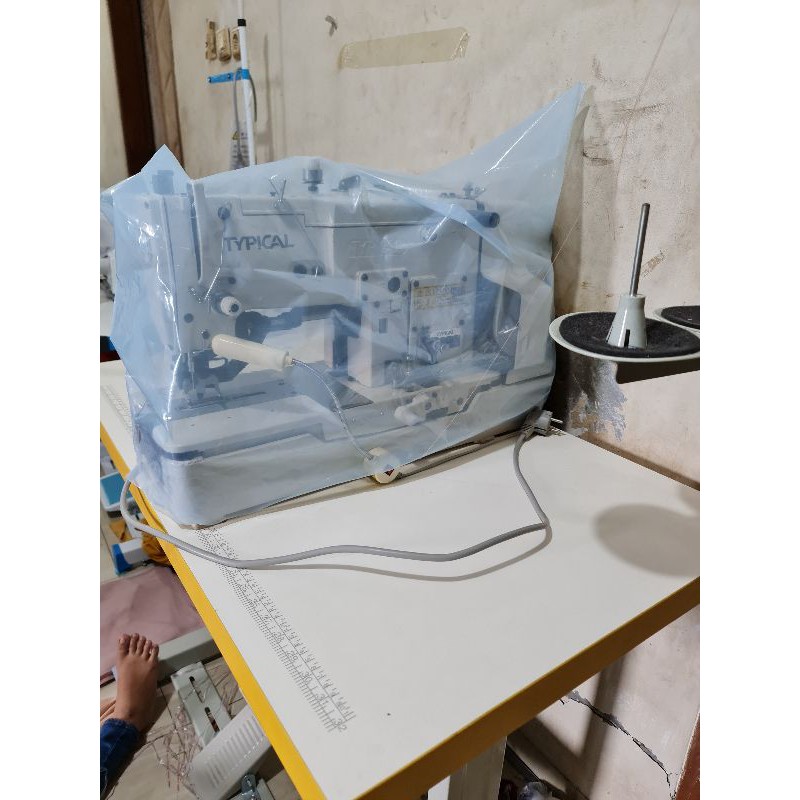 mesin lubang kancing dan mesin pasang kancing