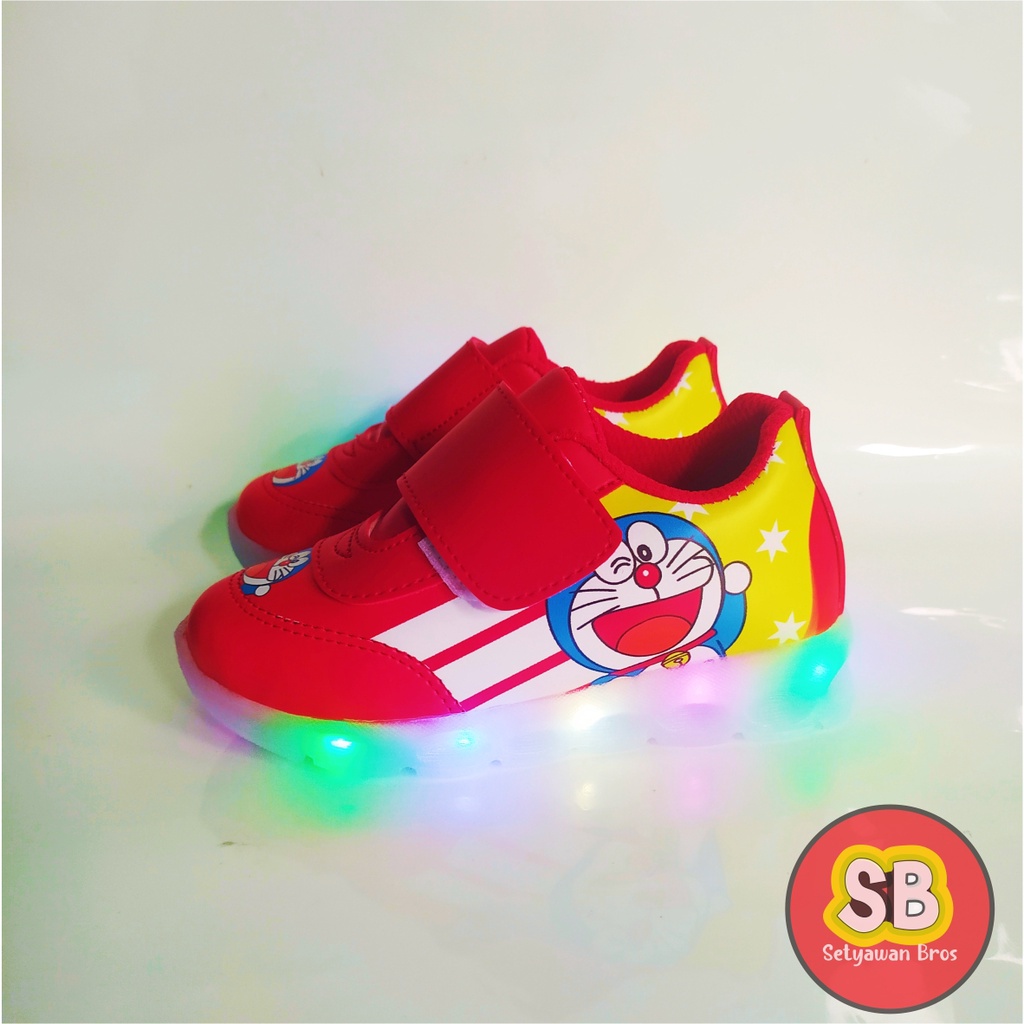 Sepatu sneaker lampu led mtif dora emon terbaru cod 1-5 thn