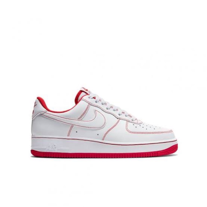 red tick nike trainers