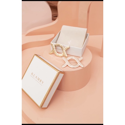 Brooch Wearing Klamby Monogram