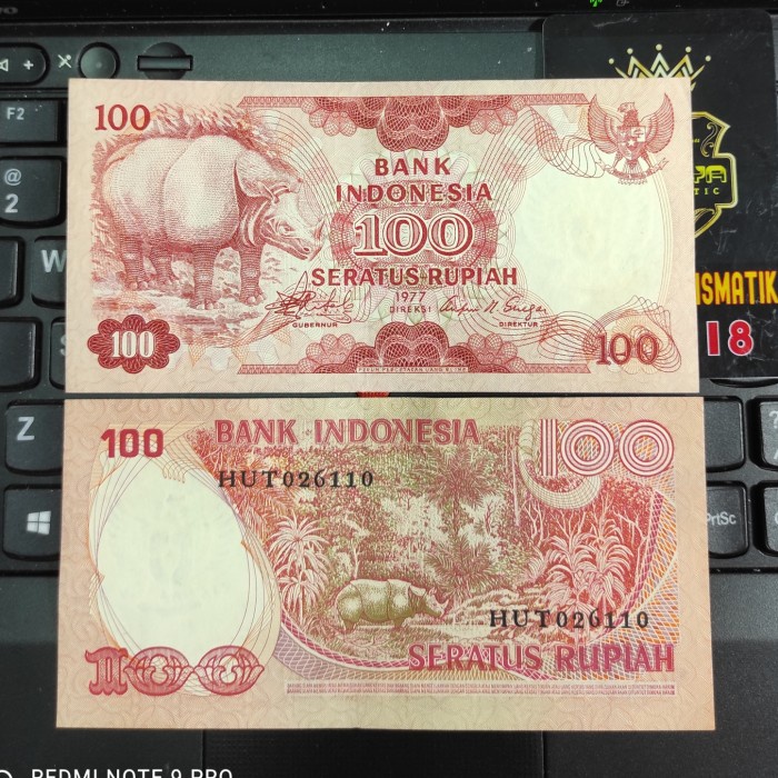 KUNO-UANG- UANG KERTAS INDONESIA 100 RUPIAH BADAK 1977 -UANG-KUNO.