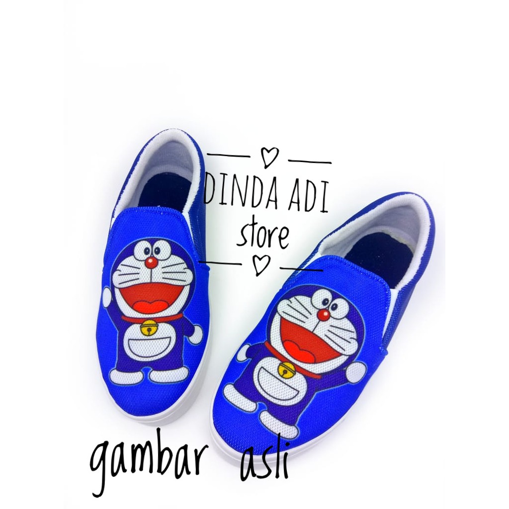 DINDA SEPATU WANITA SLIP ON DORAEMON REALPICT 100% MURAH - BIRU DAN HITAM