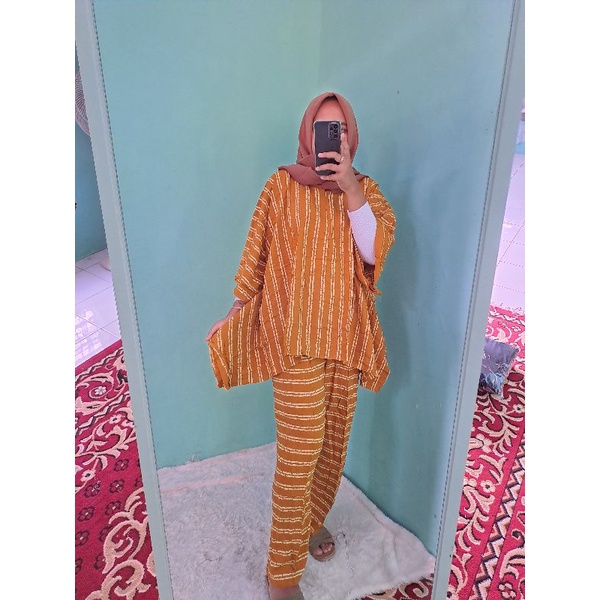 Setelan waka waka jumbo otina