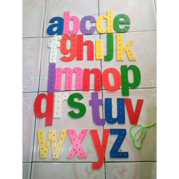 menjahit huruf abjad kecil