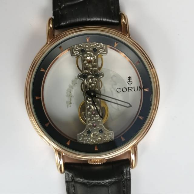 CORUM skeleton transparan Rose Gold