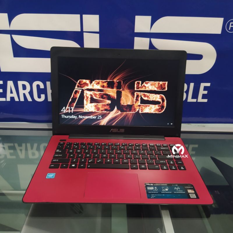 Laptop 2 jutaan asus X453MA  Ram 4GB HDD 500GB warna merah seqen mulus.