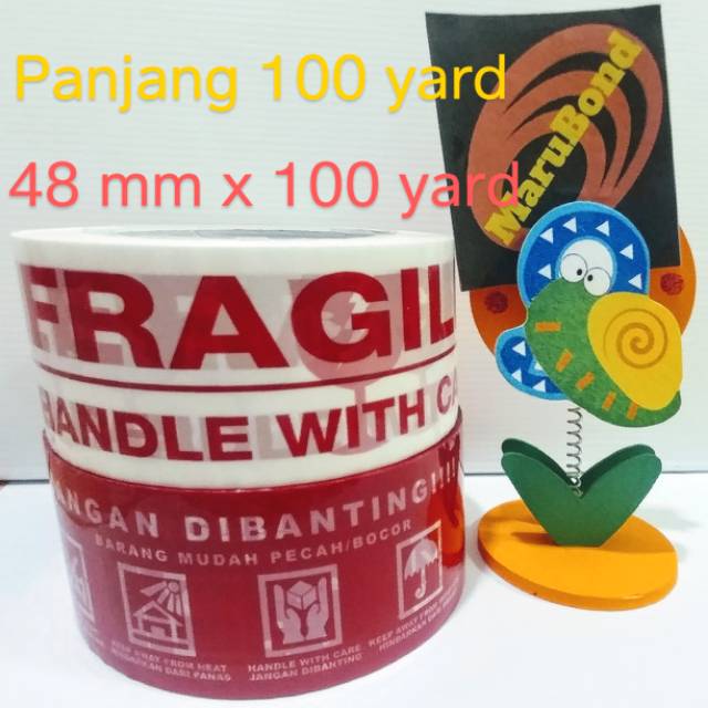 

Isolasi lakban selotip tulisan FRAGILE dan tulisan JANGAN DIBANTING 48 mm x 100 yard