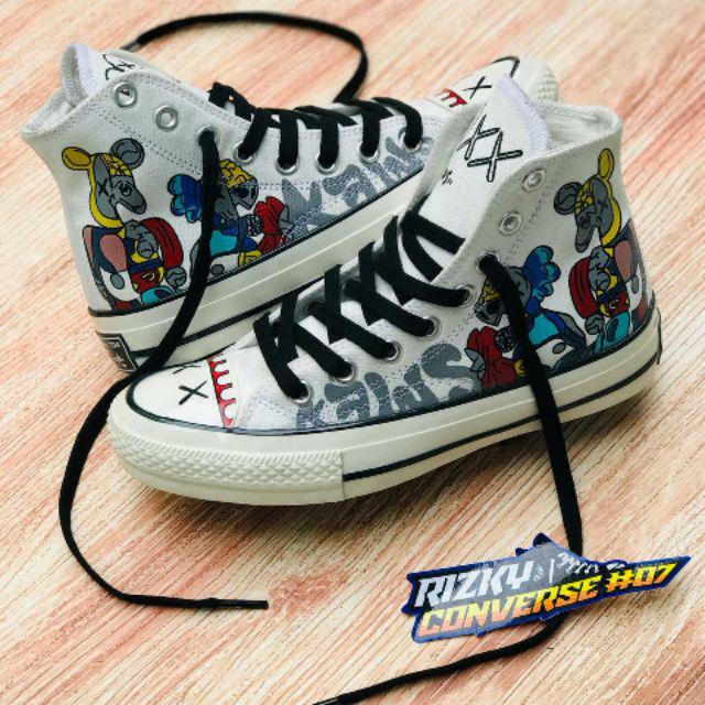harga converse x kaws