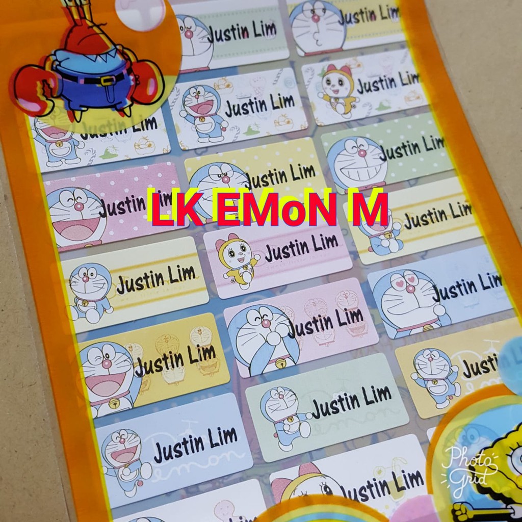 Label kain DORAEMON untuk ditempel di baju bahan lentur awet tidak mudah lepas label baju ukuran Ml
