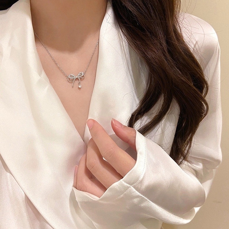 Roselife Kalung Choker Gaya Korea Liontin Pita Hias Kristal CZ Untuk Wanita