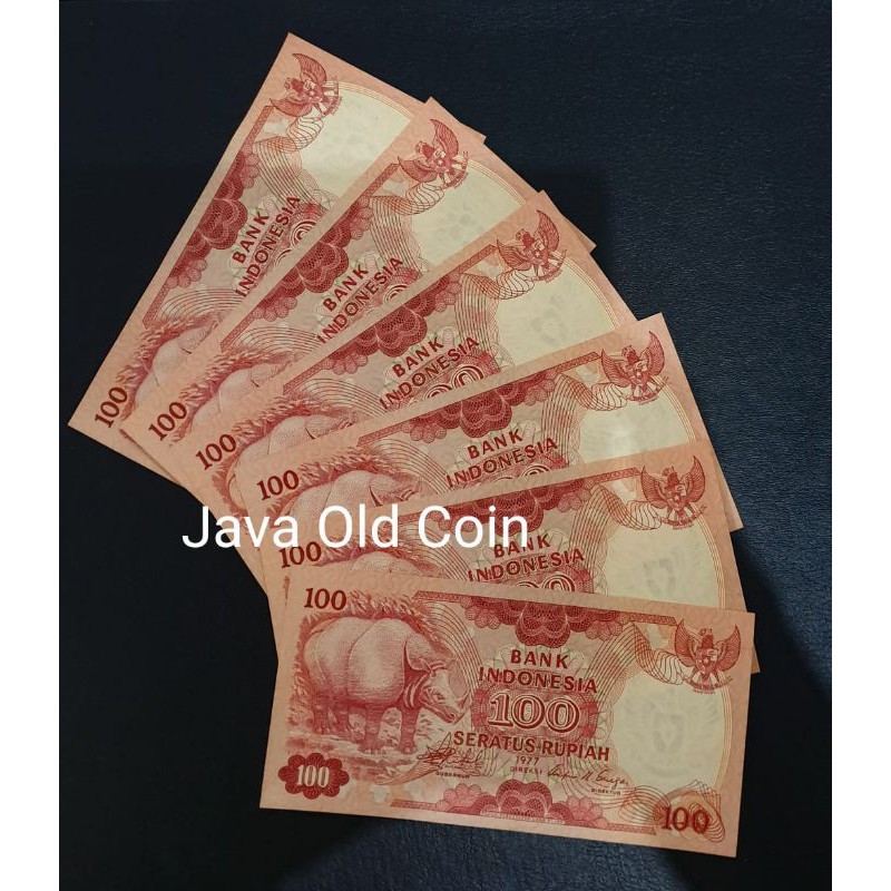 Uang kuno 100 rp 1977 Badak baru gress UNC
