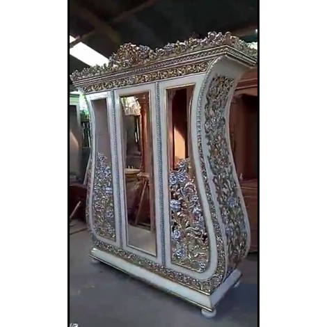 lemari hias biola,lemari pajangan,lemari kristal,lemari kaca ukir jepara