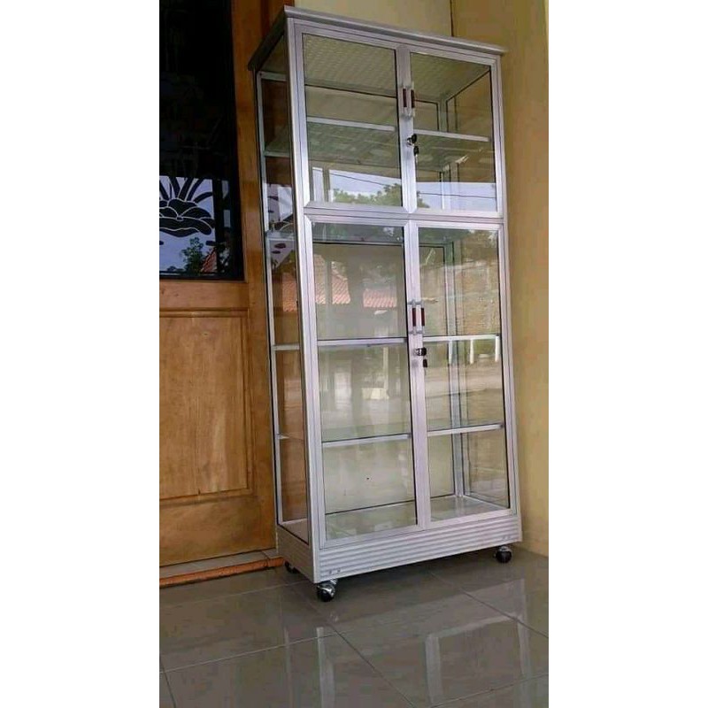 Lemari kaca boneka bahan aluminium