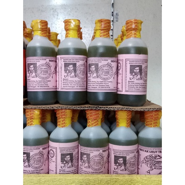 Minyak urut tradisional Karo cap biawak