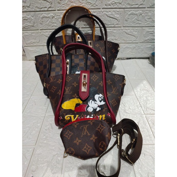 tas slempang LV kerang ( import )