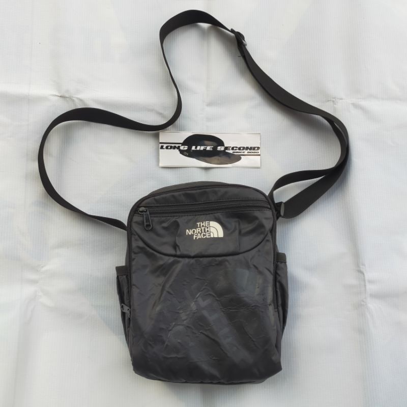 sling bag the north face second bekas preloved