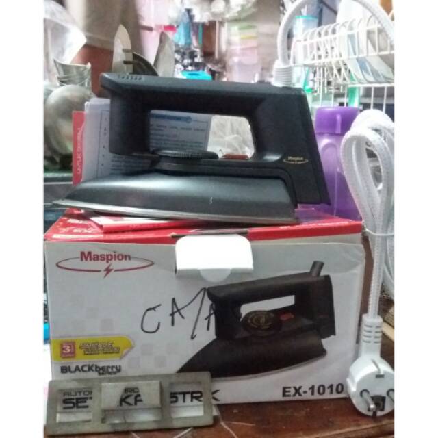 Setrika maspion teflon