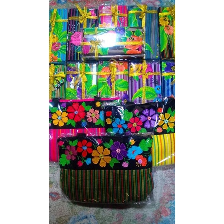 kain lurik lukis bunga