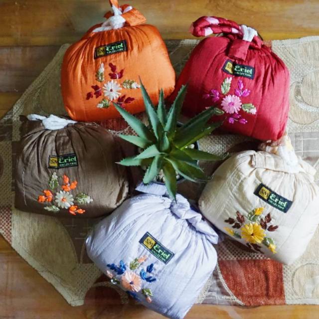 Mukena travelling bahan parasut.