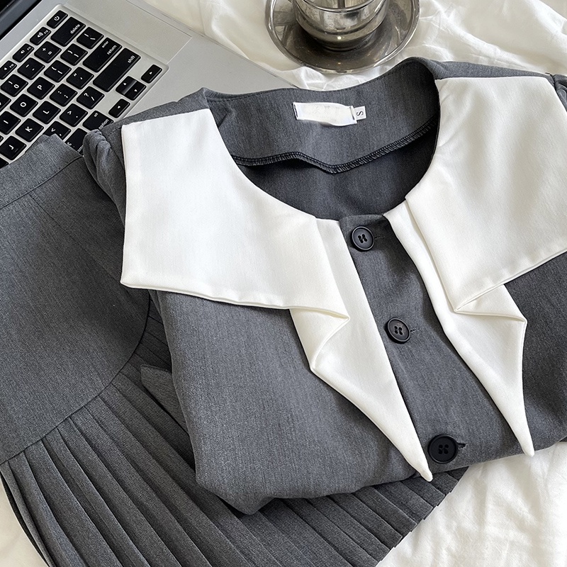 Temperamen Colorblock Collar Irregular Suit Dengan Bahu Depan Empuk Atasan Kecil + Rok Lipit Ramping Pinggang Tinggi