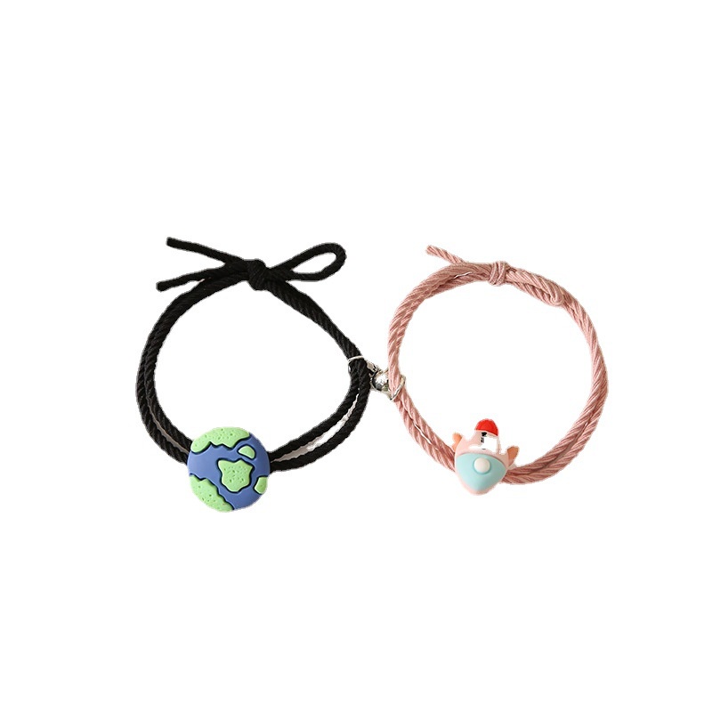 gelang magnet couple astronot