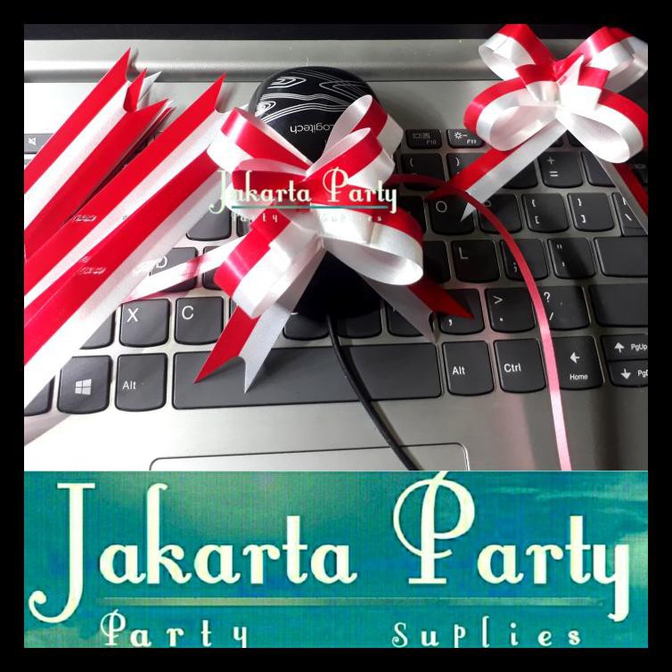 

Pita Serut Merah Putih / Pita Tarik Ukuran 22 Mm X 470 Mm / Pita Kado Termurah