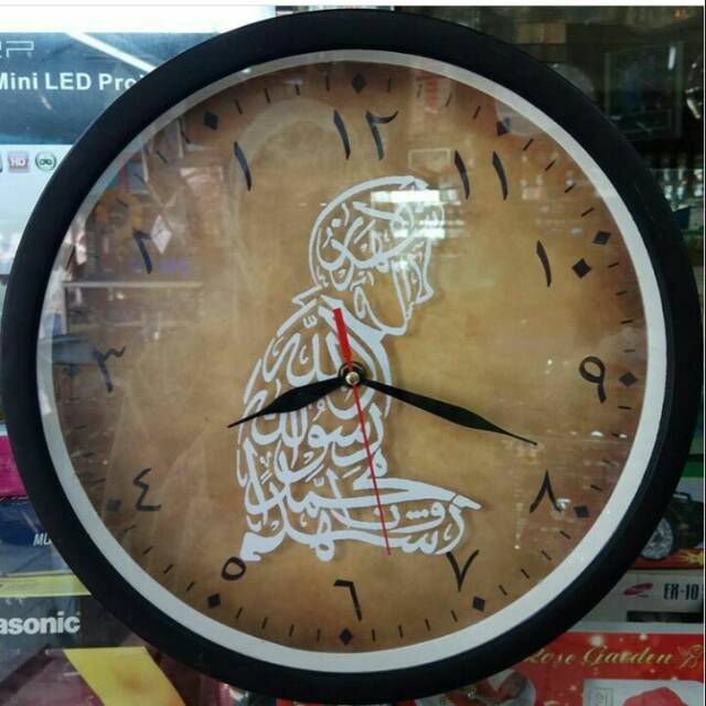 Jam dinding mundur angka arab