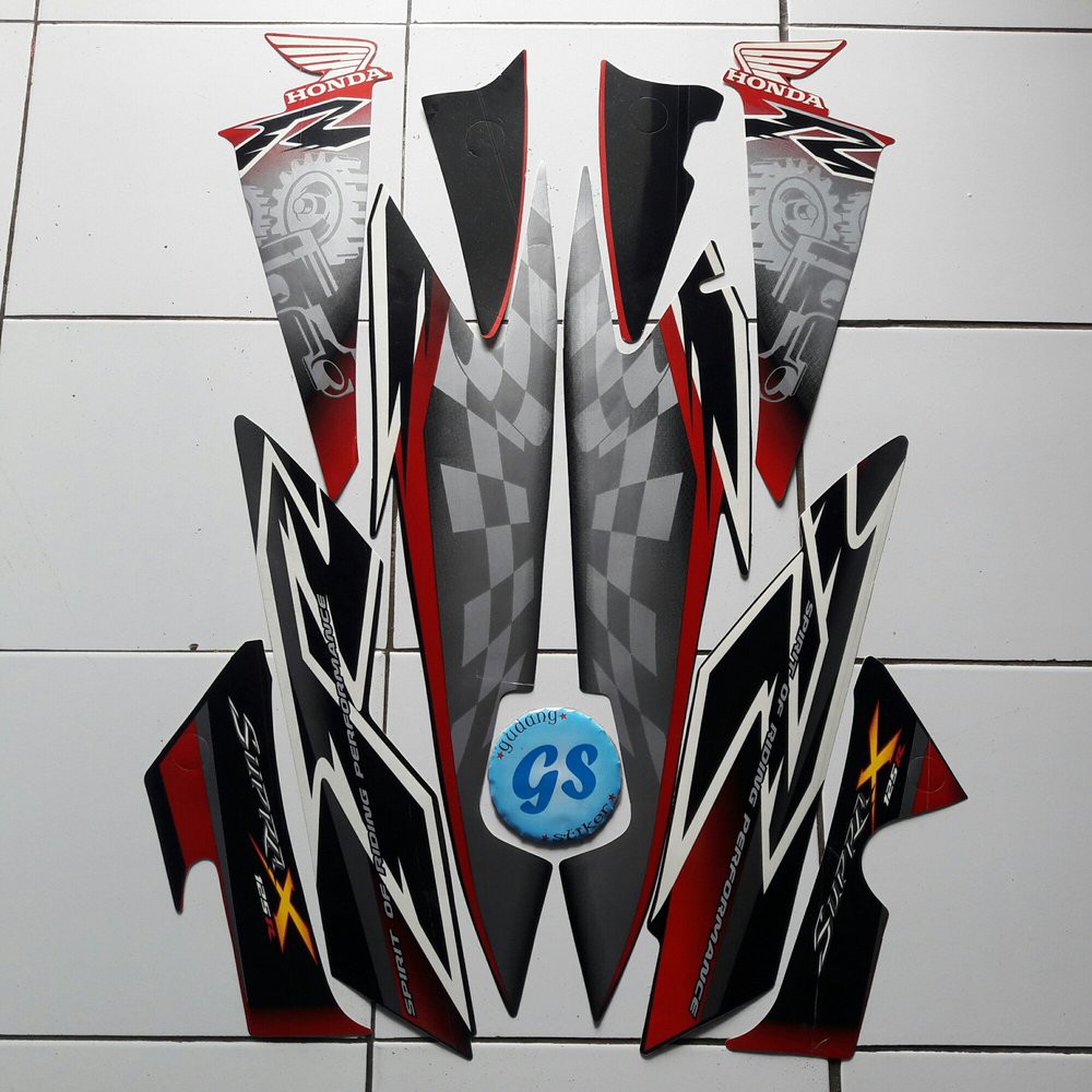 striping motor  supra x 125 2008 merah