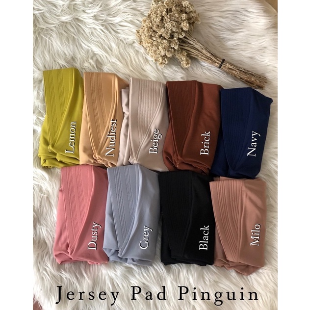 Bergo Pad Pinguin jersey Rumahan