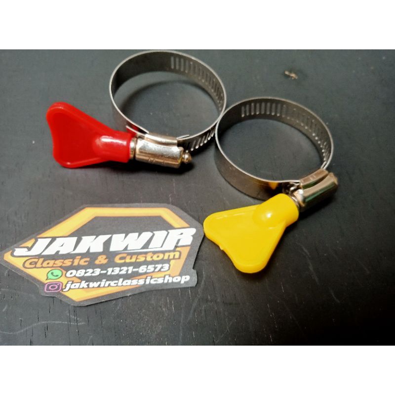 Klem kleman karbu kupu-kupu stenlis