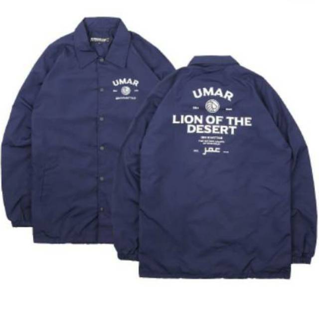 JAKET COACH ALKNOWN ORIGINAL UMAR LION OF THE DESERT NAVY