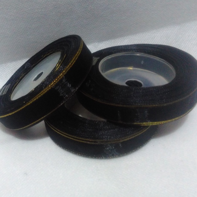 

Pita Organdi Lis Hitam Ukuran 1/2 inch Per Roll