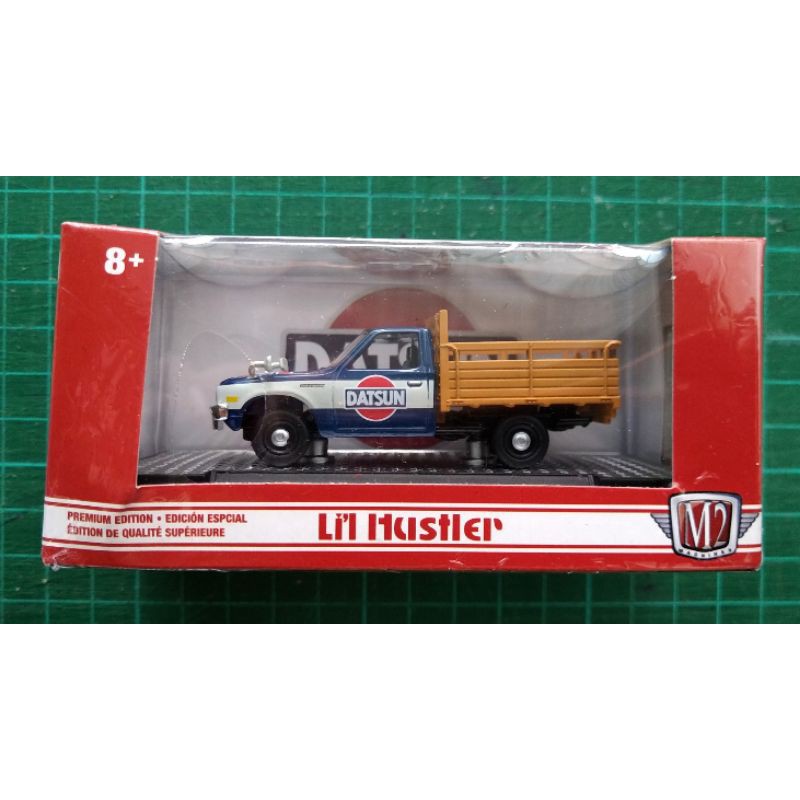 M2 MACHINES 1979 DATSUN TRUCK STAKE BED BLUE CREAM