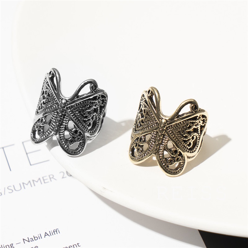 Cincin Adjustable Desain Ukiran Kupu-Kupu Hollow Bahan Alloy Warna Emas / Silver Gaya Vintage Untuk Wanita