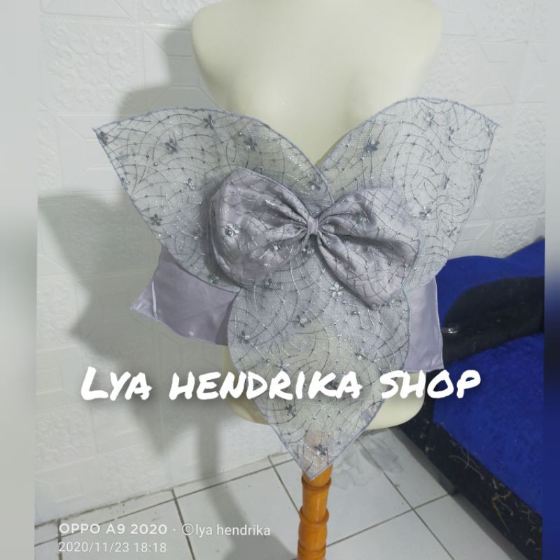 peplum kelopak bunga