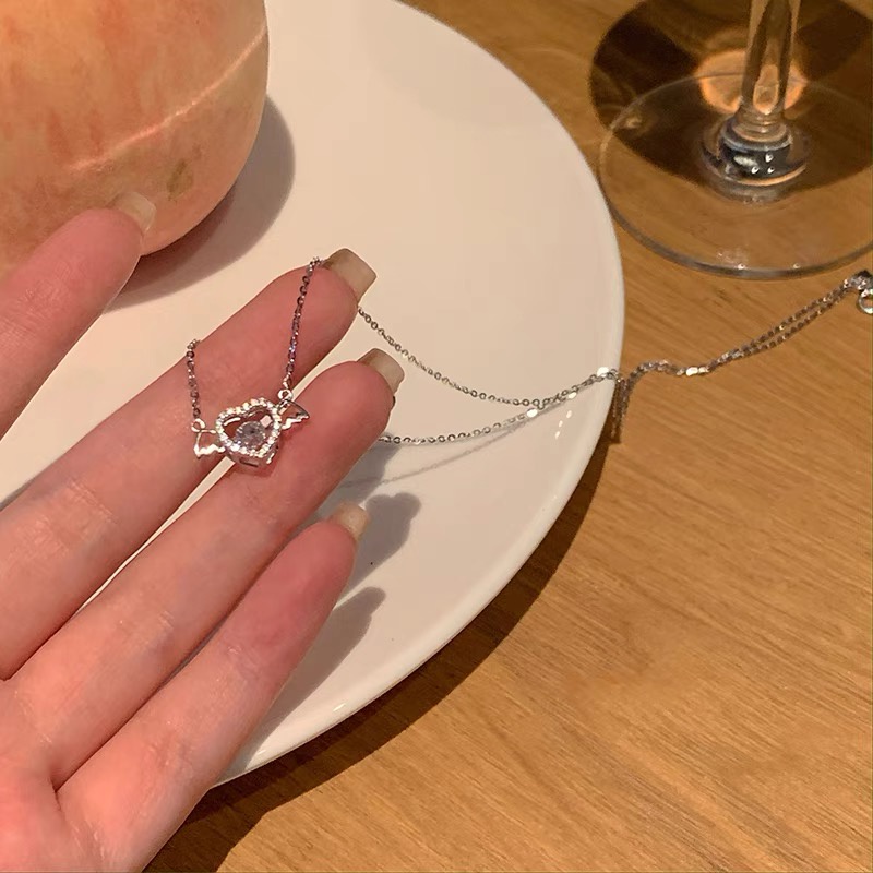 Kalung Rantai Choker Liontin Hati Sayap Aksen Kristal Warna Silver Untuk Wanita