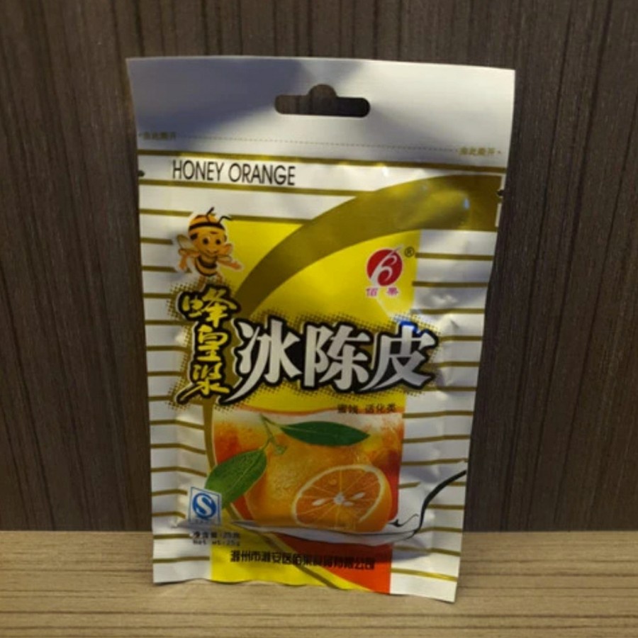 

Manisan Kulit Jeruk Madu Honey Orange Bai Guo 25 Gr