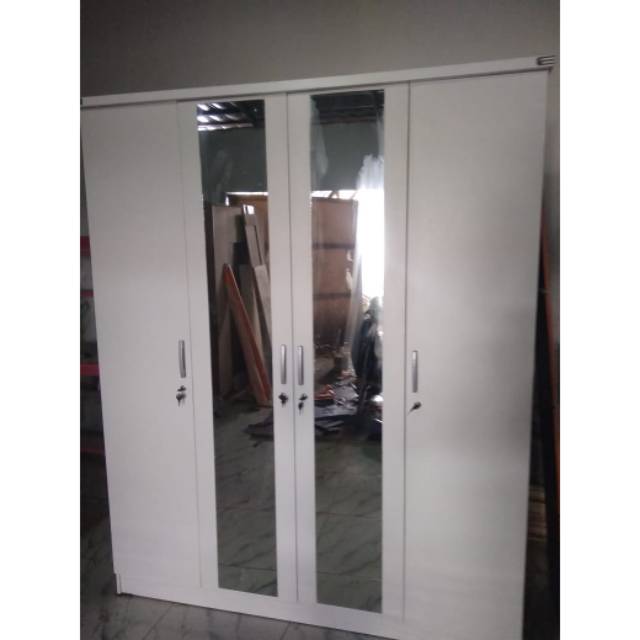 Lemari pakaian minimalis 4 pintu putih