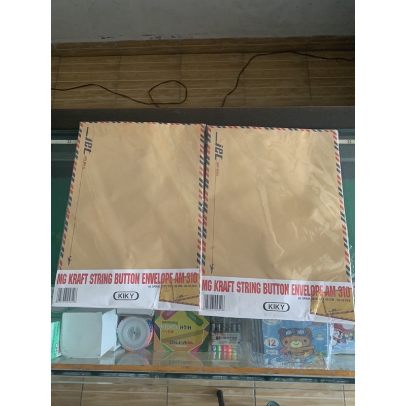 

Amplop Coklat tali airmail merk Jet isi 10